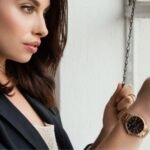 A woman Enhancing her Watch's Appearance